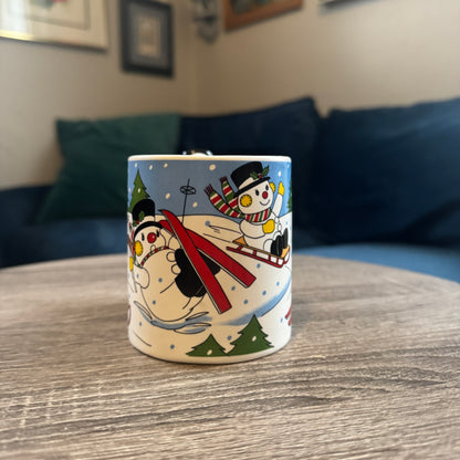 Skiing Snowmen Mug w/ Snowman Handle (Black Hat)
